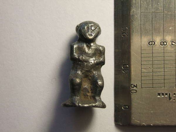 Небольшой серебряный идол из д. Стайки.